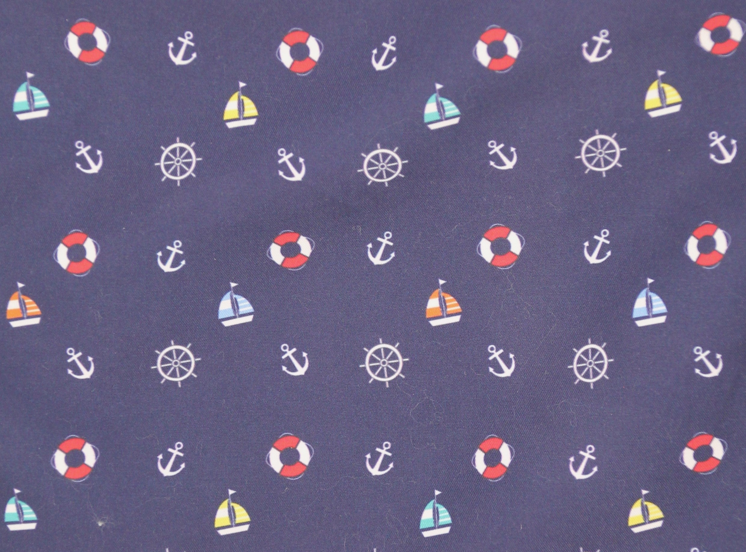 LIGHT BLUE OCTOPI SWIMSUIT WITH NAVY BACKGROUND