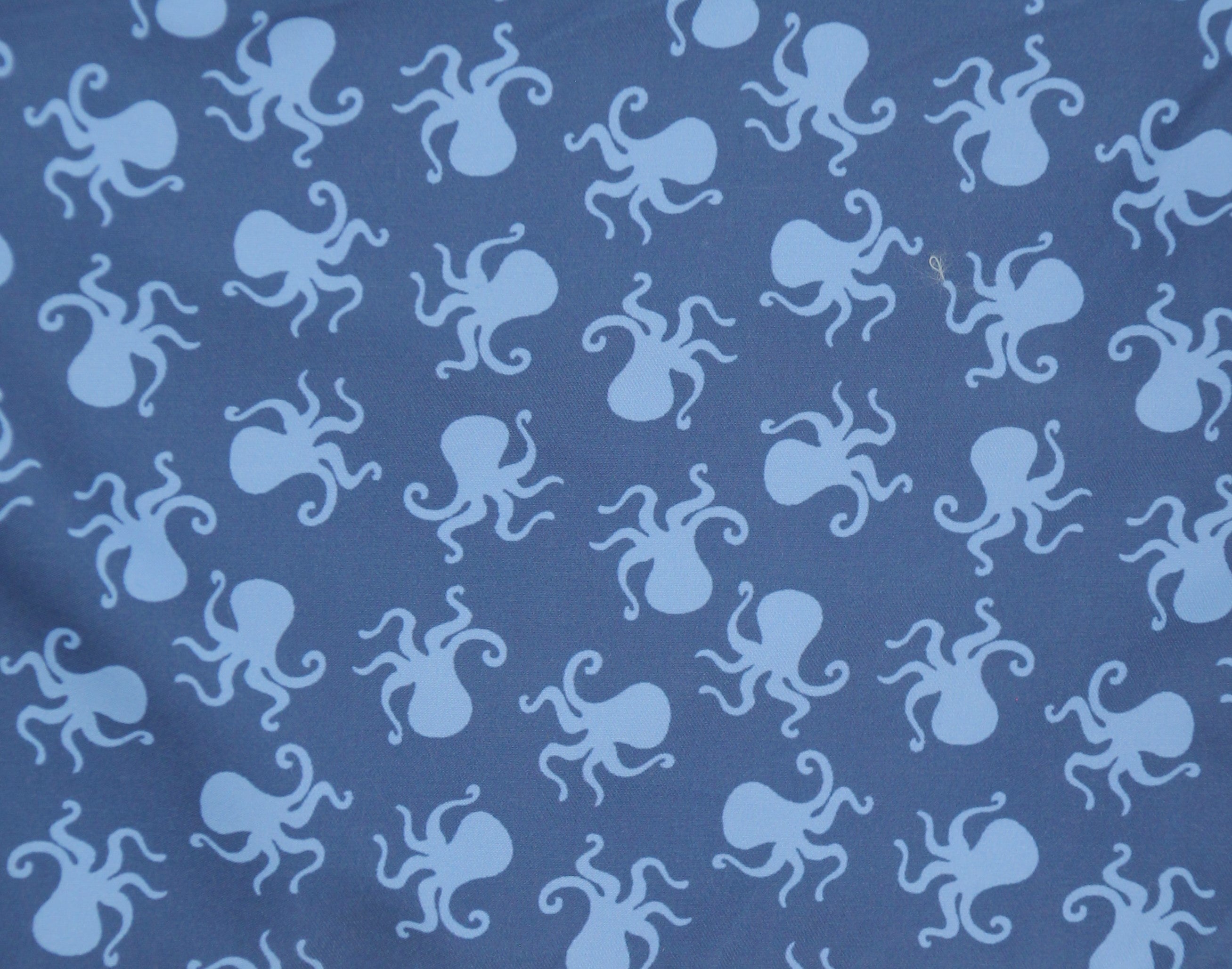 LIGHT BLUE OCTOPI SWIMSUIT WITH NAVY BACKGROUND